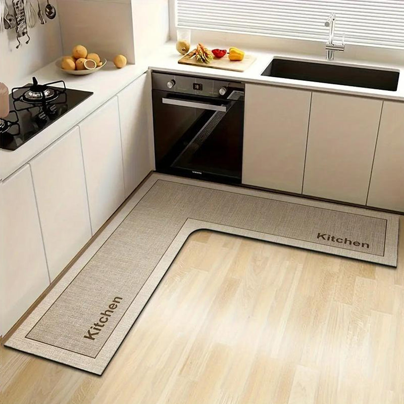 🎉2026 Sale Over 17,000 Sold! 🔥50% OFF! 🧊💧 Stop slipping on wet kitchen floors — this L-shaped mat absorbs water and oil fast, stays put, and cushions your feet while you cook. 🏠