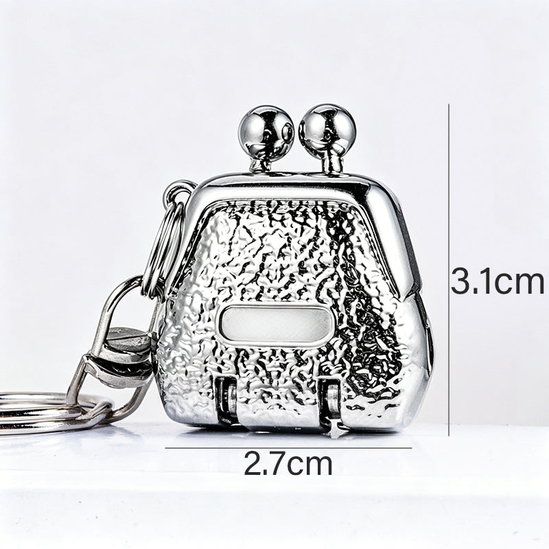 📢 1 ACHETÉ = 1 OFFERT ! ⏰ Coupe-Ongles Porte-Clés en Forme de Sac à Main Pliable – Ultra Compact, Lames Précises & Finition Métallique – Allie Mode et Fonctionnalité 👜✨