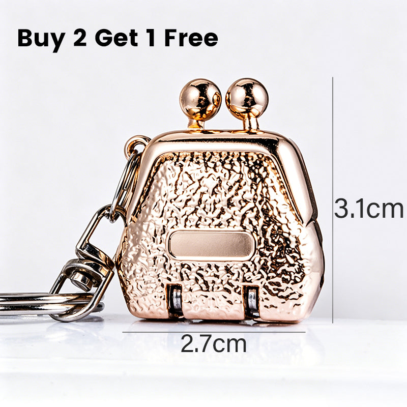 📢 1 ACHETÉ = 1 OFFERT ! ⏰ Coupe-Ongles Porte-Clés en Forme de Sac à Main Pliable – Ultra Compact, Lames Précises & Finition Métallique – Allie Mode et Fonctionnalité 👜✨