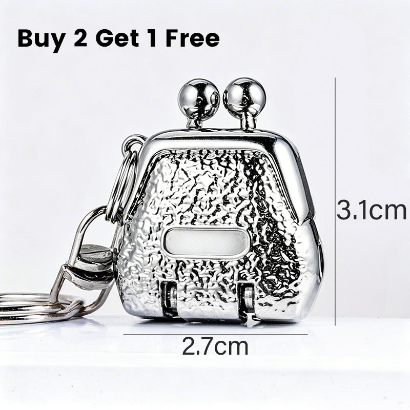 📢 1 ACHETÉ = 1 OFFERT ! ⏰ Coupe-Ongles Porte-Clés en Forme de Sac à Main Pliable – Ultra Compact, Lames Précises & Finition Métallique – Allie Mode et Fonctionnalité 👜✨