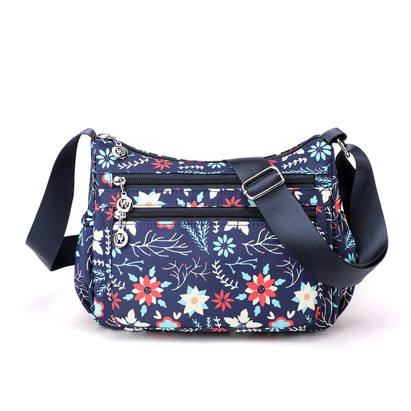 🔒🎒 Sac bandoulière nylon voyage – Multi-poches, fermeture sécurisée, format compact mais spacieux, parfaite pour les escapades et le quotidien 🗺️☕