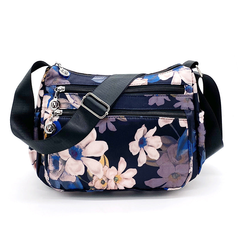 🔒🎒 Sac bandoulière nylon voyage – Multi-poches, fermeture sécurisée, format compact mais spacieux, parfaite pour les escapades et le quotidien 🗺️☕