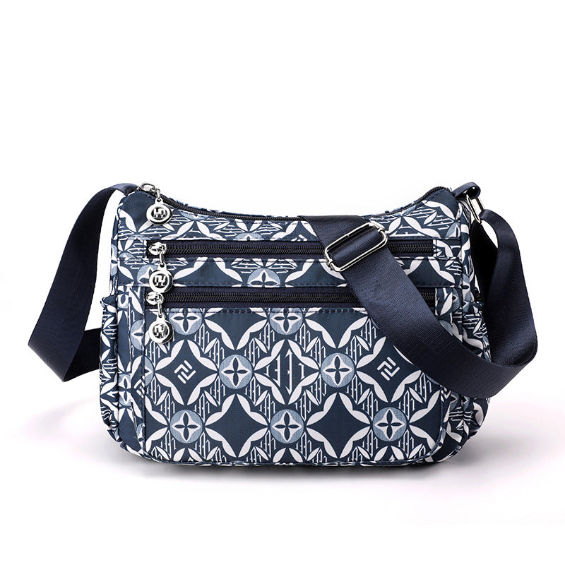 🔒🎒 Sac bandoulière nylon voyage – Multi-poches, fermeture sécurisée, format compact mais spacieux, parfaite pour les escapades et le quotidien 🗺️☕