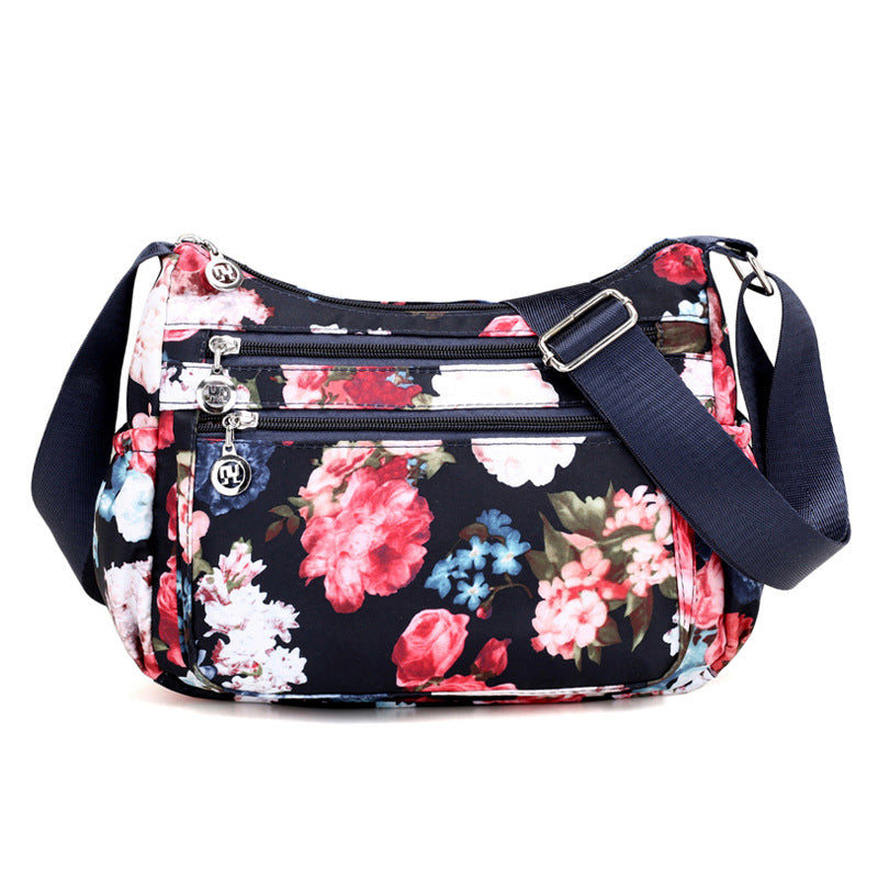 🔒🎒 Sac bandoulière nylon voyage – Multi-poches, fermeture sécurisée, format compact mais spacieux, parfaite pour les escapades et le quotidien 🗺️☕