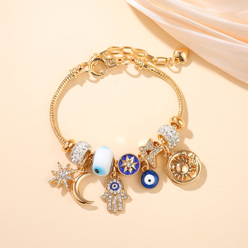 ☀️ -50% ! 🌙 Bracelet à Breloques Célestes Soleil et Lune – Alliage Doré – 18–22 cm Ajustable – Strass et Émail – Cadeau Astral ✨